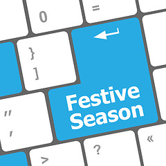 Image showing festive season button on modern internet computer keyboard key