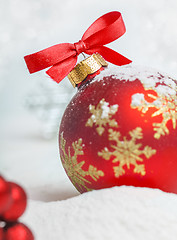 Image showing Christmas ball with red bow and ribbon