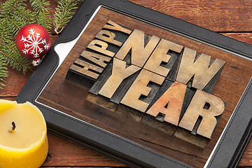Image showing happy new year on digital tablet