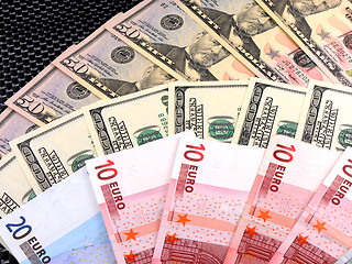 Image showing Background from dollar and euro different banknotes