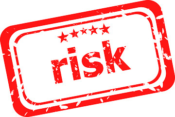 Image showing risk red rubber stamp over a white background