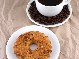 Image showing Coffee and coffee beans on white plate with sweet cake