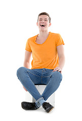 Image showing Young man laughing out loud, on white background