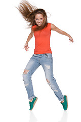 Image showing young woman hip hop dancer with grunge wall background texture