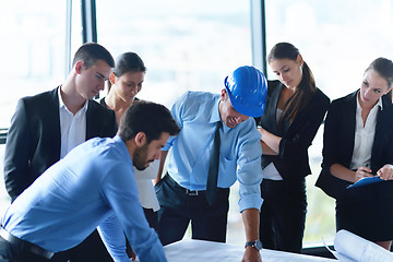 Image showing business people and engineers on meeting