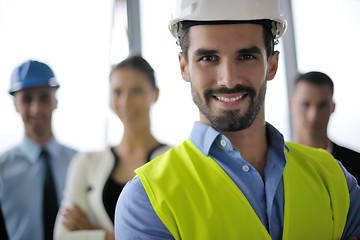 Image showing business people and engineers on meeting