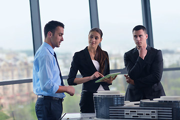 Image showing business people and engineers on meeting