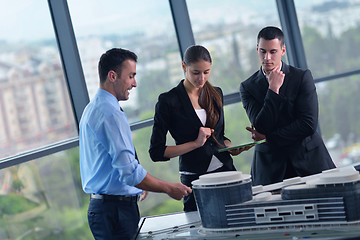 Image showing business people and engineers on meeting