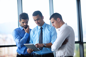 Image showing business man using tablet compuer at office