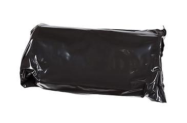 Image showing Black cellophane pack isolated on white background