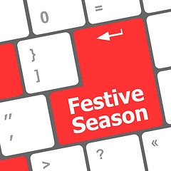 Image showing festive season button on modern internet computer keyboard key