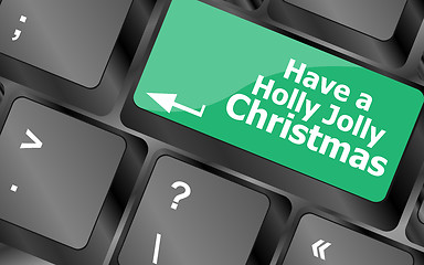 Image showing Computer keyboard key with have a holly jolly christmas words