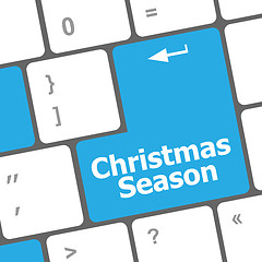 Image showing Computer keyboard key with christmas season words