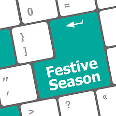 Image showing festive season button on modern internet computer keyboard key