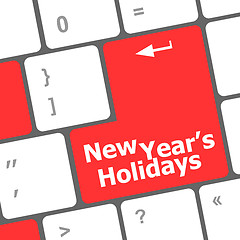 Image showing Computer keyboard key with new year holidays words