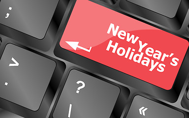 Image showing Computer keyboard key with new year holidays words