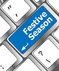 Image showing festive season button on modern internet computer keyboard key