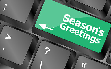 Image showing Computer keyboard with seasons greetings keys - holiday concept