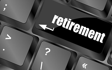 Image showing retirement for investment concept with a button on computer keyboard