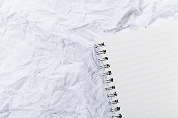 Image showing White crumple paper and notepad