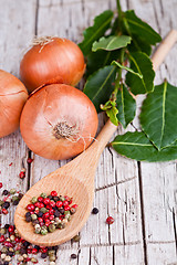 Image showing fresh onions, bay leaves and peppercorns