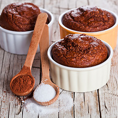 Image showing fresh baked browny cakes, sugar and cocoa powder 