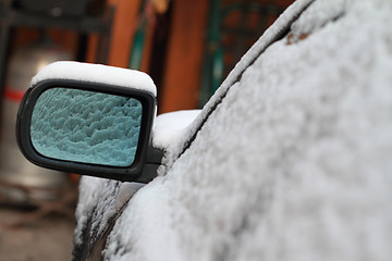 Image showing Snowy car from the mirror
