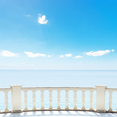 Image showing white balcony on terrace near sea and blue sky