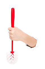 Image showing Hand with toilet brush