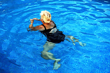 Image showing woman swiming