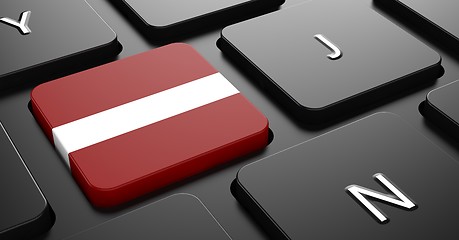 Image showing Latvia - Flag on Button of Black Keyboard.