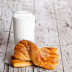 Image showing glass of milk and fresh baked buns