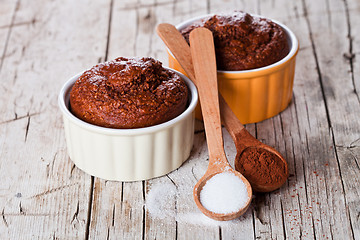 Image showing fresh baked browny cakes, sugar and cocoa powder 