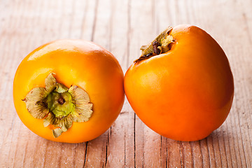 Image showing two fresh persimmons