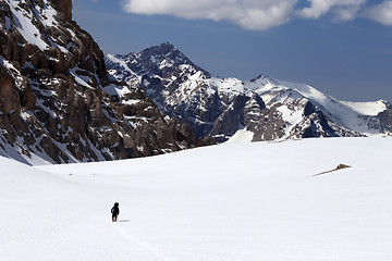 Image showing Hiker in snowy mountains