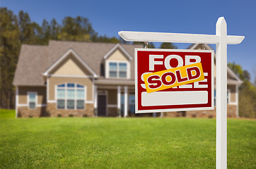 Image showing Sold Home For Sale Sign in Front of New House