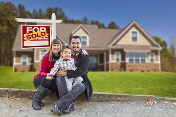 Image showing Mixed Race Family, Home, Sold For Sale Real Estate Sign