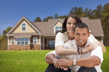 Image showing Happy Hispanic Young Couple in Front of Their New Home