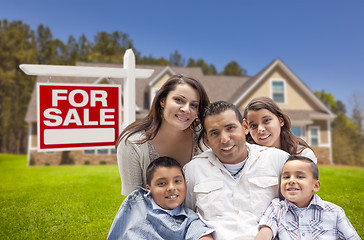 Image showing Hispanic Family, New Home and For Sale Real Estate Sign