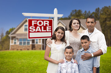 Image showing Hispanic Family, New Home and For Sale Real Estate Sign
