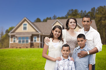 Image showing Young Hispanic Family in Front of Their New Home