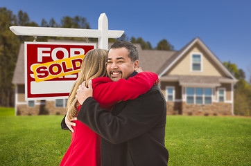 Image showing Mixed Race Couple, House, Sold Real Estate Sign