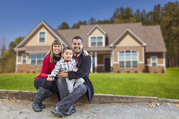 Image showing Mixed Race Family in Front of Their New Home