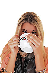 Image showing Girl drinking soup.