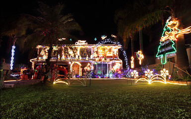 Image showing Family house decorated with Christmas lights and decorations