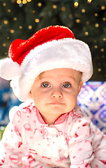 Image showing Adorable female toddler in Christmas clothes