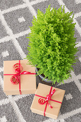 Image showing Presents near little Christmas tree