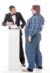 Image showing Elegant man arguing with a country yokel