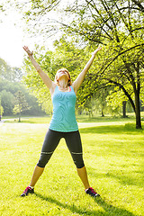 Image showing Woman exercising in park