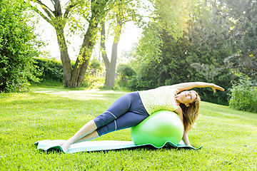 Image showing Woman on yoga balance ball